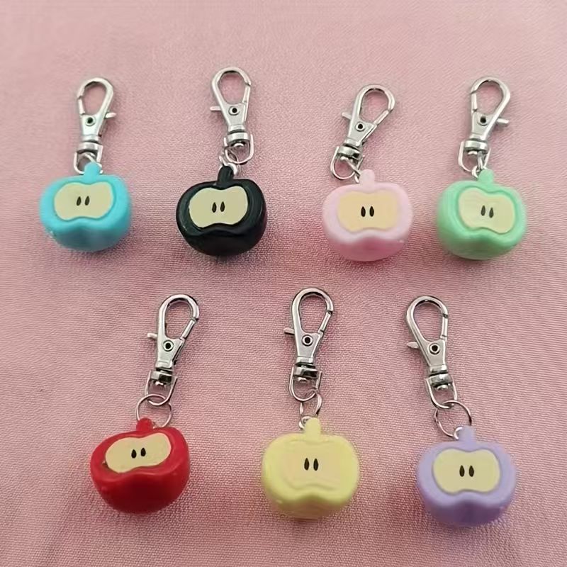 7 قطع من سلسلة مفاتيح على شكل  - مراجعة Phone Accessories Keychain وسعره